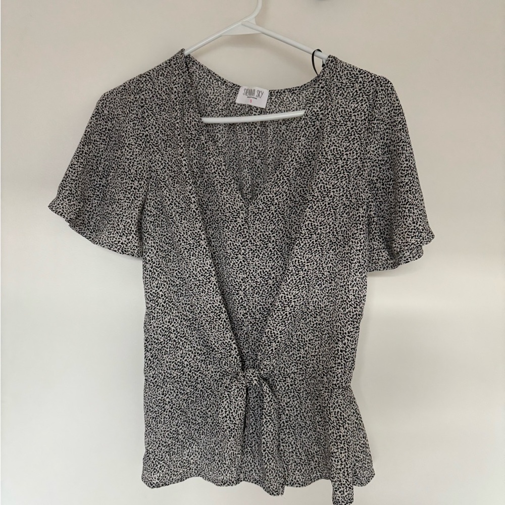 Sienna Sky Black and White Short Sleeve Wrap Blouse
